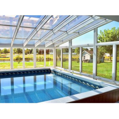 China Heat Preservation Clear Laminated Glass Greenhouse Inclined Roof Glass Enclosed Sunrooms Prefab Glass Greenhouse For Swimming Pool for sale