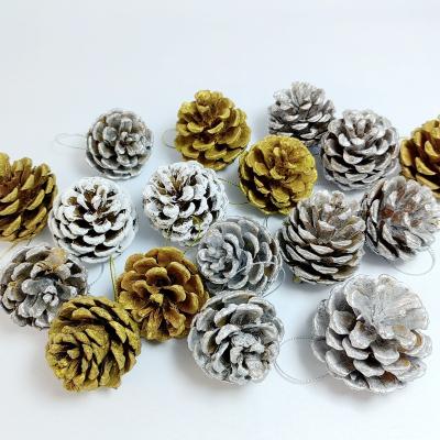 China Chirstmas Decor Christmas Pine Cones Snow Tipped Natural Pine Cones Wooden Frosted Pine Cone Ornaments for Decorating and Designing for sale