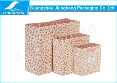 China Environmentally Friendly Paper Packaging Bags Flower Pattern With Rope Handles for sale