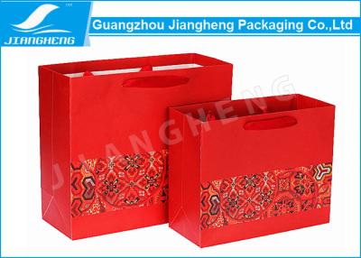 China Glossy Durable Gift Paper Bag Packaging Red Chinese Festival Style for sale