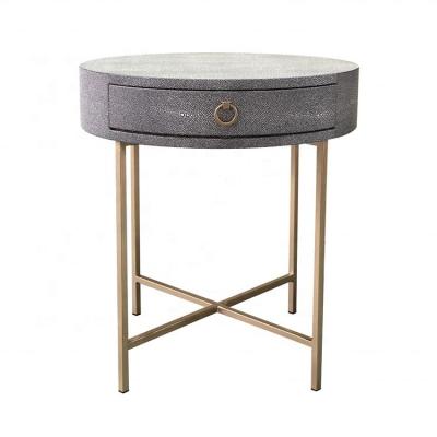 China Modern design untreated leather bedside round leather bedside table HLM02G for sale