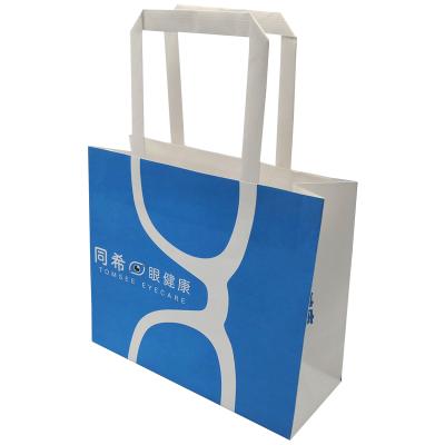 China Custom Logo Art Paper Bags Handle Tiny Mini Blue Paper Craft Bags Wirh Famous Brand Recyclable Factories for sale