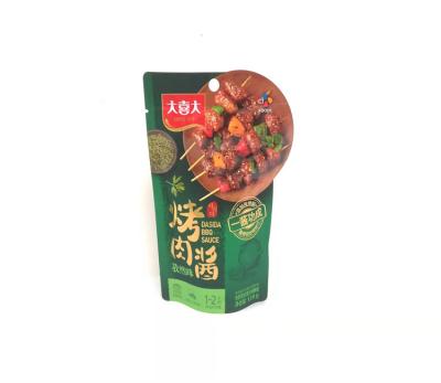 China Disposable Custom 110g Plastic Bags Stand Up Gravure Printing Plastic Retort Bag For Sauce With Round Hole for sale