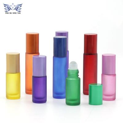 China Wholesale Empty Essential Oil Perfume Bottle Roll Ball Personal Care Glass Roll On Bottle With Plastic Cap for sale