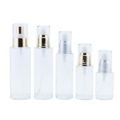 China Factory Empty Glass Lotion Personal Care Cosmetic Contianer 35ml 40ml 60ml 80ml 100ml With Pump Cap for sale