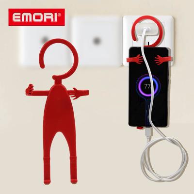 China Durable Colorful Human Shape Cell Phone Holder Silicone Mobile Charger Hanger for sale