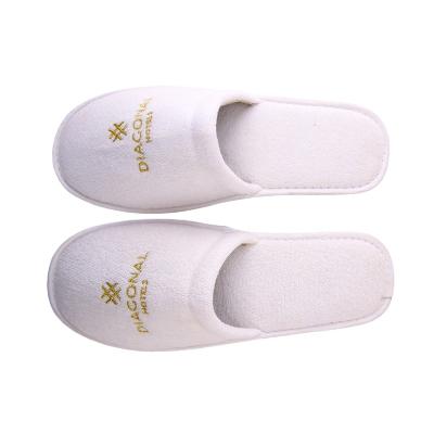 China Soft Custom Design White Logo Hotel Terry Hotel Slipper for sale