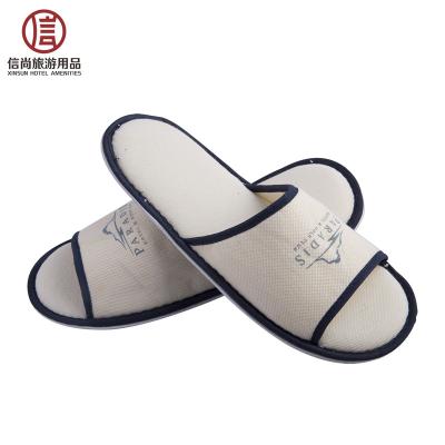 China Soft Comfortable Anti-Slip Fabric Unique Hotel Branded Slippers for sale