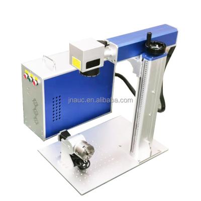 China Laser Marking 3w 5w UV Fiber Marking Machine Perfume Bottle Laser UV Spotting Machine On Glass for sale