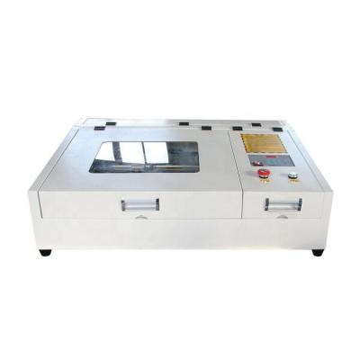 China Laser Engraving 3020 Desktop Paper 40W/50W CO2 Rubber Stamp Laser Cutting Machine / k40 Laser Engraving Machine for sale