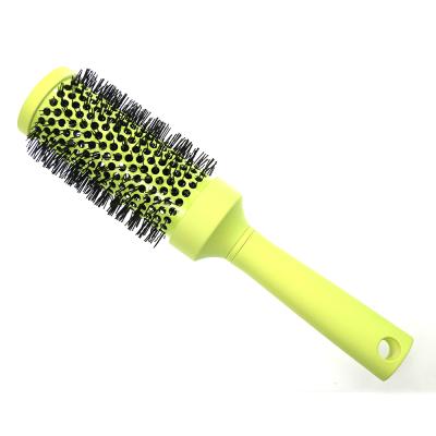 China Hot Sale Salon Ceramic Hair Brush Custom Logo Paddle Heat Resistant Round Ceramic Ionic Hair Brush for sale