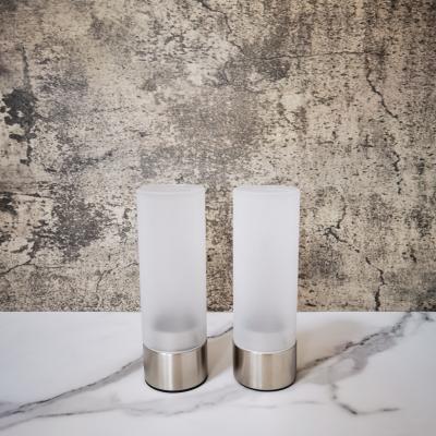 China Sustainable Concise Elegant Housewares 2pcs Set 201 Stainless Steel Metal Frosted Glass Tealight Candle Holder for sale