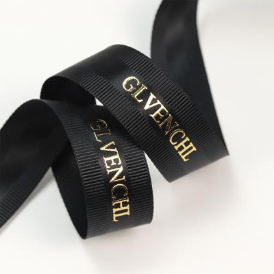 China Wholesale Custom 3d Recyled Embossed Logo 1 Inch Polyester Ribbon Gold Foil Black Silk Grosgrain Printed Ribbon for sale