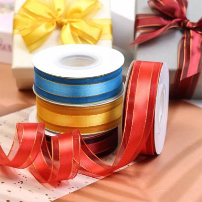 China Luster Manufacture customized glitter edge gold ribbon and bows for gift wrap for sale