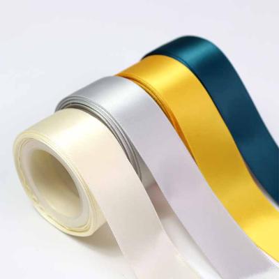 China Recyled Lude Branded Custom Bright Yellow Solid Double Faced Polyester Satin Ribbon Roll for sale