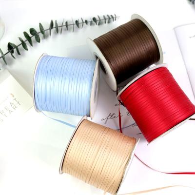 China Eco Friendly Red 100% RPET Polyester Satin 3mm Ribbon Roll for sale