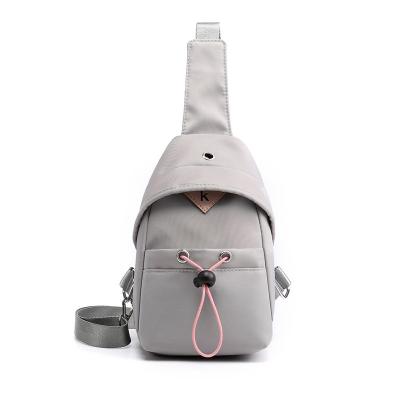 China High Quality Hot Sale Waterproof Trunk Bag With Earphone Hole Girls And Boys Outdoor Messenger Bag Sling Bag For Teenagers for sale