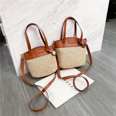 China Fasion 2021 Summer New Korean Version Simple Shoulder Bag Straw Bucket Bag Small Crossbody Bag For Woman for sale