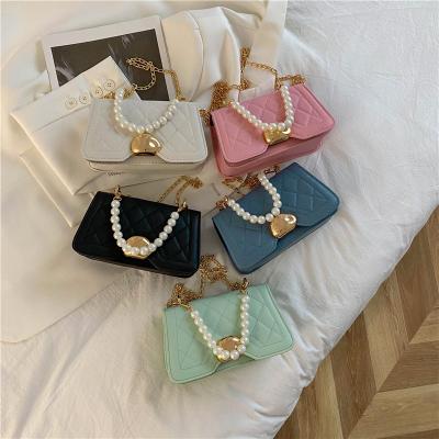 China 2021 New Embroidered Bag Female Summer Fashion Daily Used Bead Chain Cross - Body Bag Small Flap Bag for sale