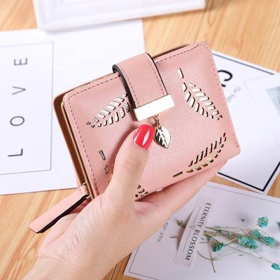 China 2021 Hollow Leaves Mini Women Wallet Purses and Handbags PU Leather Zipper Ladies None Coins Card Purse for sale