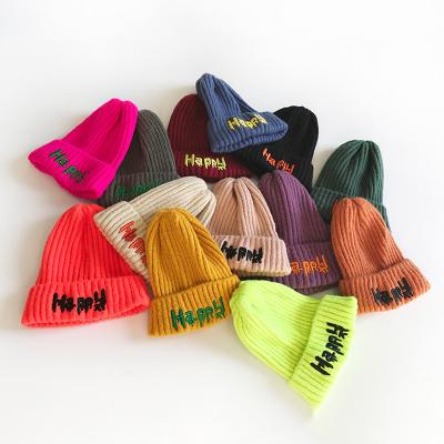 China Cotton Women Letter Solid Color Beanie Female Outdoor Winter Hat Knitted Embroidery Warm Hat for sale