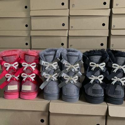 China Usb Wholesale Fashion Ladies Sheepskin Women Kids Winter Snow Sliver Fur Boots With Bows 2020 - GT for sale