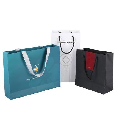 China Recyclable Wholesale Custom Printed Logo Luxury Paper Bag Boutique Retail Shopping Gift Paper Bags With Your Own Logo for sale