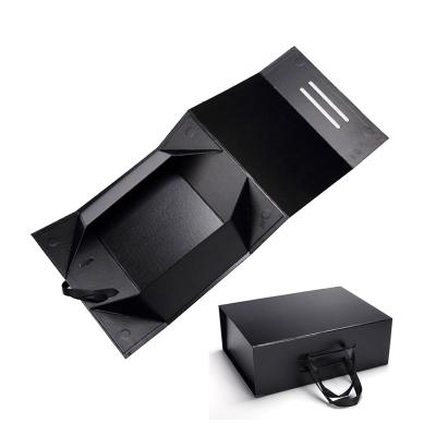 China Recycled Materials Custom Matte Black Paper Gift Box Ribbon Portable Gift Box Magnetic Closing Magnetic Closing Clothing Packaging Box for sale