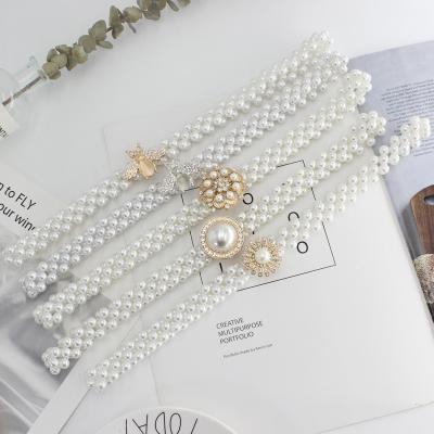 China Fashion Ladies Rhinestone Pearl Waist Chain Bohemian Women Dress Bow-knot Female Flower Decorated Elastic Belt for sale