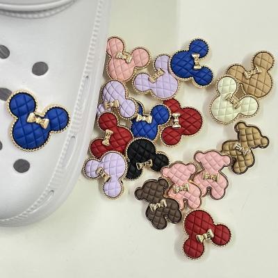 China 2022 Washable Wholesale Cheap Hot Sale Cartoon Character Metal Shoe Charms Stock Number Baby Accessories For Croc Shoes for sale