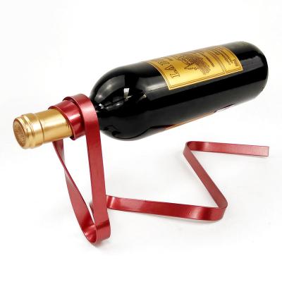 China Art Decor Home Simple Creative Color Ribbon Hanging Wine Rack Gravity Balance Wine Rack Novelty Gift Ornaments GYP024 for sale