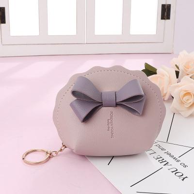 China 2023 New PU Mini Wallet Keychain Portable Storage Zipper Bag Bowknot Coin Conch Fashionable High Quality Purse Leather Key Chain for sale