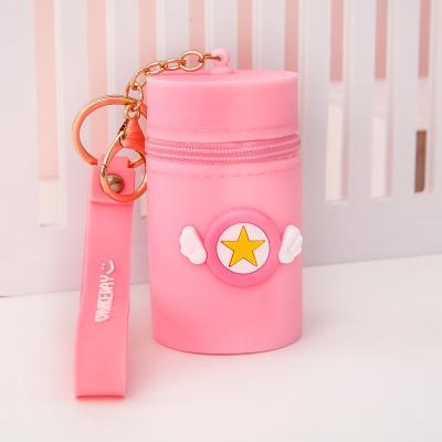 China Fashionable Hot Bucket Zero Wallet Zero Bucket Key Ring Portable Earphone Storage Key Bag Storage Silicone Cartoon Key Chain for sale