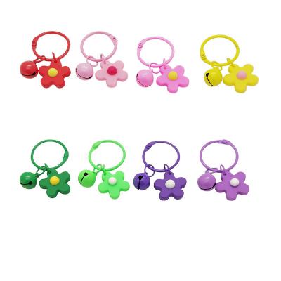 China New Trendy Korean Simple Candy Color Small Flower Bells Key Chain Ring Bag Pendant Flower Keychains for sale