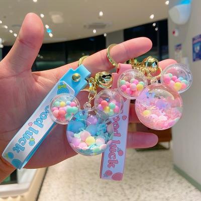 China Fashionable Cute Acrylic In Oil Quicksand Bottle Key Chain Oil Floating Mouse Liquid Key Chain For Bag Pendant for sale