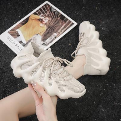 China CUSHIONING couple pattern Lightweight Hot Selling high quality fly woven fashionable women sport running sports shoes for sale