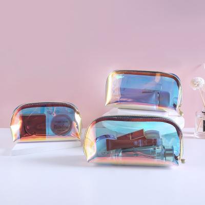 China Low MOQ Waterproof Custom Logo Clear Transparent Holographic Makeup Bag Make Up Pouch PVC Cosmetic Bags For Women for sale