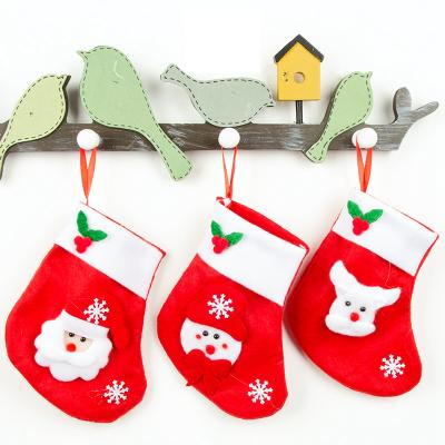 China Tissue Accessories Christmas Buds Gift Bag Christmas Ornaments Candy Bag Kids Santa Socks Small Gifts for sale