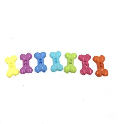 China Sustainable Fashionable Multicolor Bone Shaped Plastic Button For Baby Coat DIY Handwork for sale