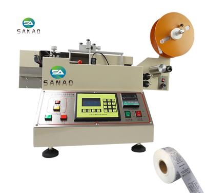 China ALC-103A High Speed ​​Automatic Beverage Brand Label Garment Woven Cutting Machine for sale