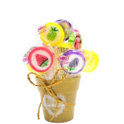 China Normal Sweet Fruits Shape Lollipop Fluorescent Long Stick Fruits Lollipop for sale