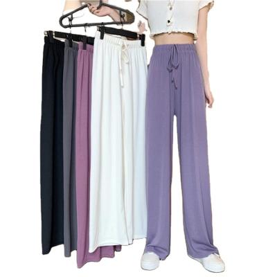 China Fashion Anti-Static Autumn Casual Zipper Pockets Pleated Plaid Printed Wide Leg Pants For Ladies Womens Trousers for sale