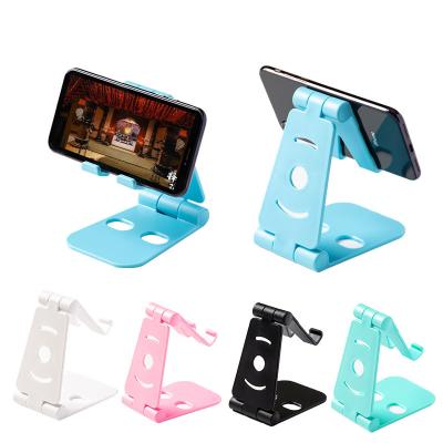 China New Adjustable Plastic Metal Metal Folding Tablet Holder Lazy Phone Holder Double Base Filling Folding Bracket For Mobile Phone Tablet for sale