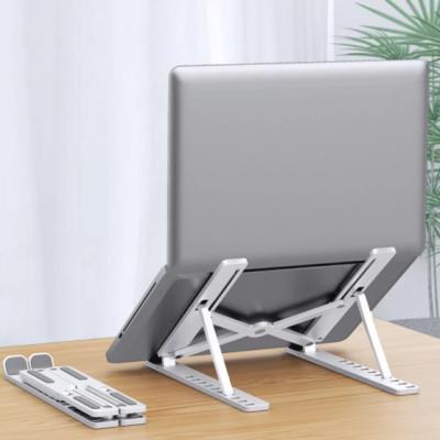 China Foldable Adjustable Portable ABS Laptop Bracket Foldable Notebook Stand Holder Macbook Air Stand Laptop Accessories for sale