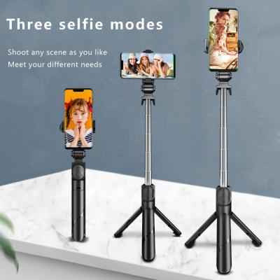 China Fold Portable Selfie Stick With Retractable Multifunctional Tripod BT Selfie Stick Lightweight Compatible Mobile Phone Holder For iPhone for sale