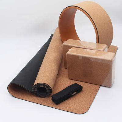 China Eco-Friendly Gym Fitness Natural Rubber Cork Yoga Mat Wheel Strap And Block Sets Non-slip/Durable/Eco-friendly Custom Printing Label for sale