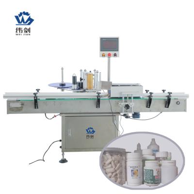 China Labeling Machine Automatic Sticker Bottles Manual Food Round Bottle Labeling Machine for sale