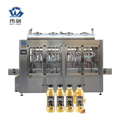 China Professional Automatic Honey Liquid Filling Machine 16 Head Filling Machine 4000BPH for sale