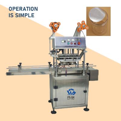 China Beverage Manual Machine Tin Film Bottle Mouth Sealing Capping Machine for sale