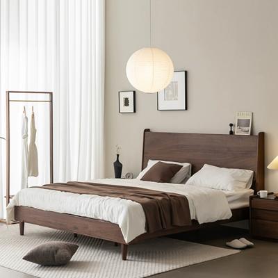 China Contemporary black solid wood walnut double bed Nordic style, modern and minimalist, light luxury, bedroom 1.5 by 1.8m for sale